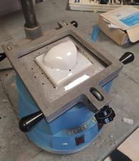 Vacuum forming the protective shell